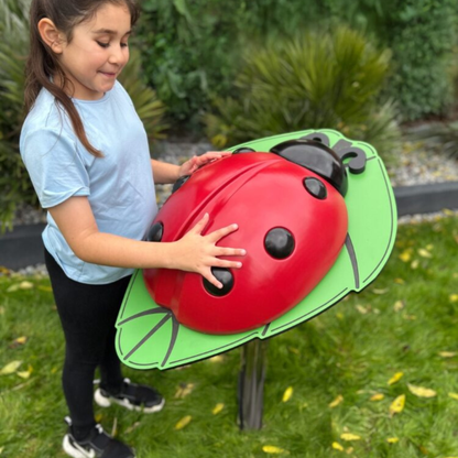 The Ladybug, utendørs musikkskulptur